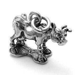 COW CHARM CHARM IN 3D STERLING SILVER.